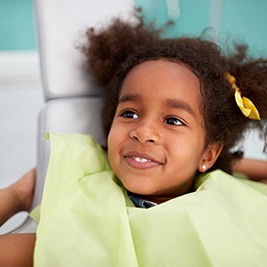 Smiling child in dental chair