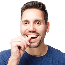 Man placing Invisalign tray