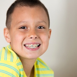 young boy smiling