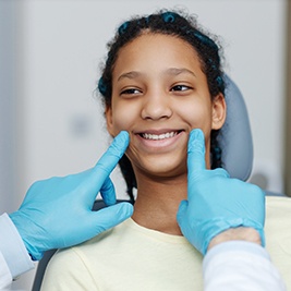 Patient in Auburn talking to dentist during dental checkup