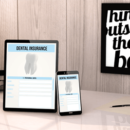 Dental insurance information displayed on tablet and smartphone