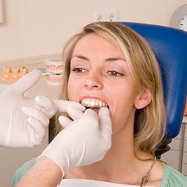 Woman having aligner fitted