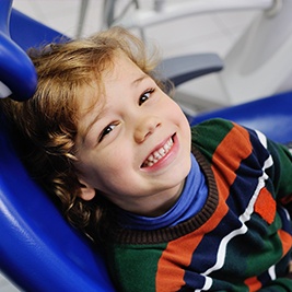 Smiling child in dental chair