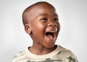 Smiling boy with strong immune system and great oral health