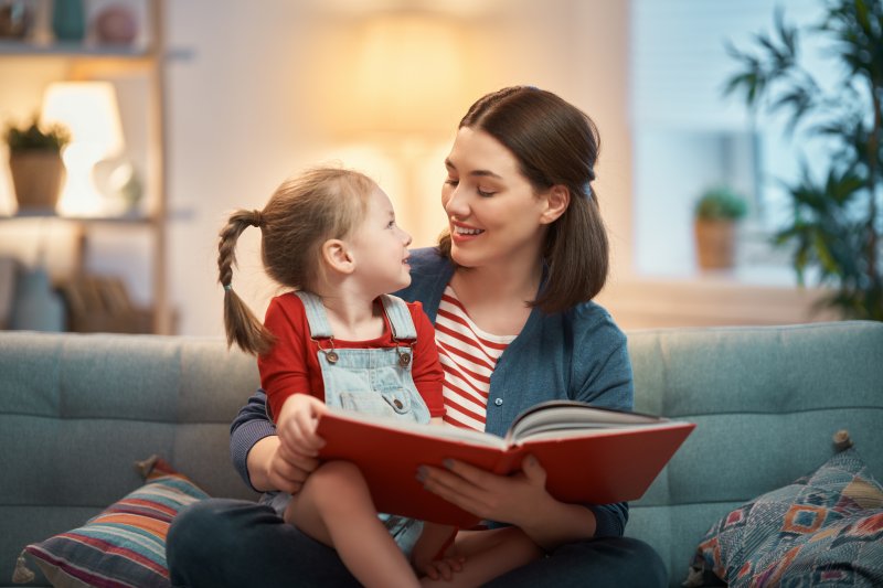 mother reading to child